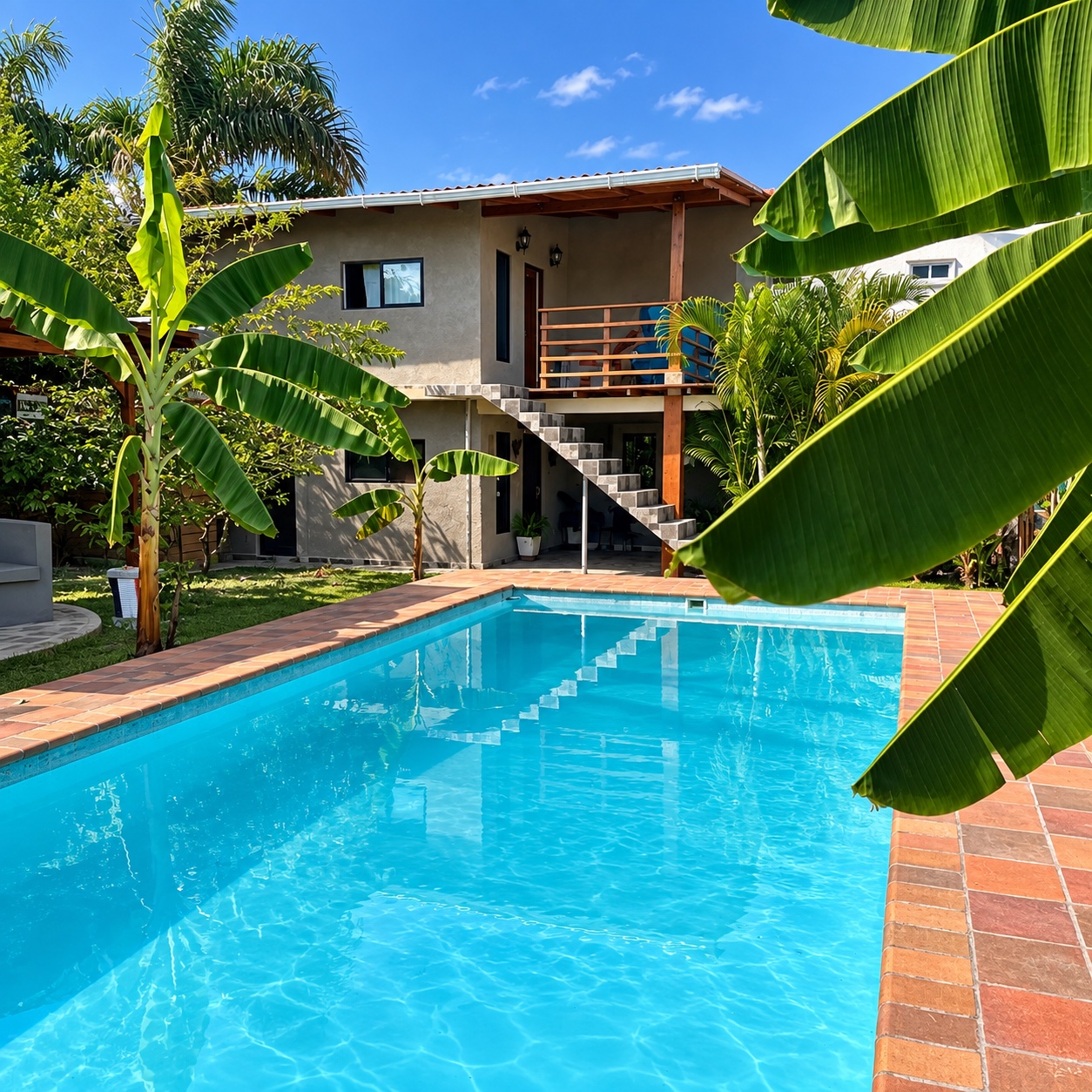 Piscina y jardín tropical de La Casita de Campo